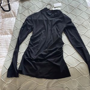 New black turtle neck with scrunching on side